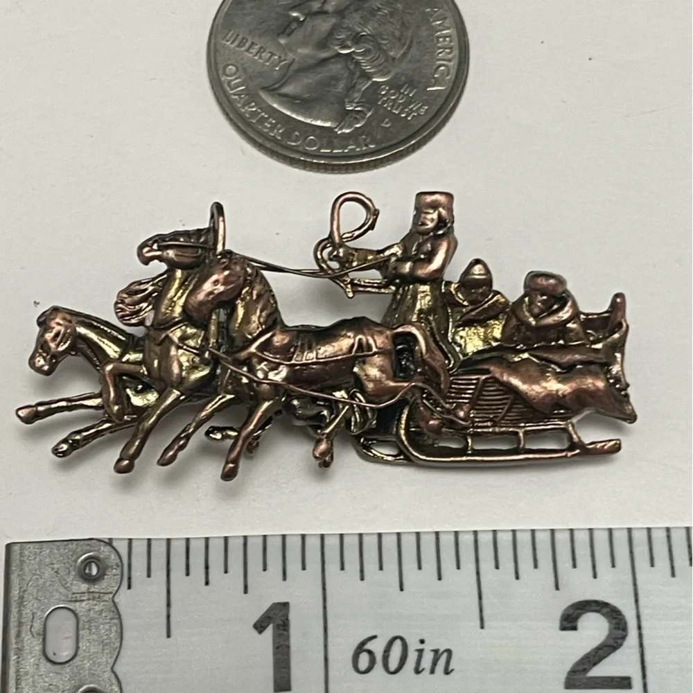 Reproduction of antique Russian Troika brooch
